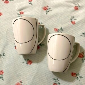 Pair of porcelain coffee mugs